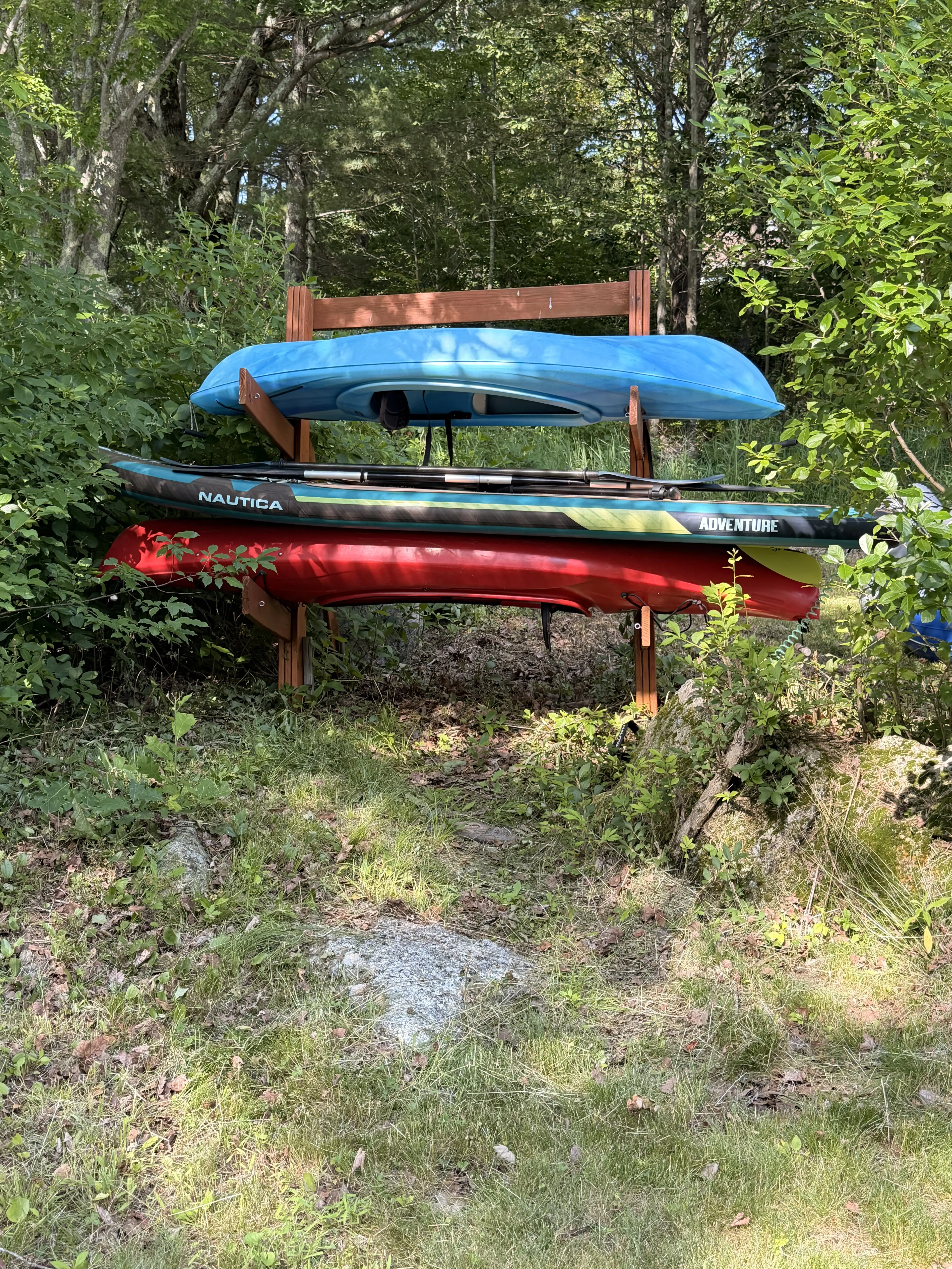 Kayaks and paddleboard at rest — Harmony House, Harvey Lake NH