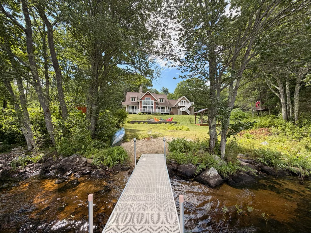 The house from the water — Harmony House, Harvey Lake NH